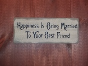 Happiness is being married to...